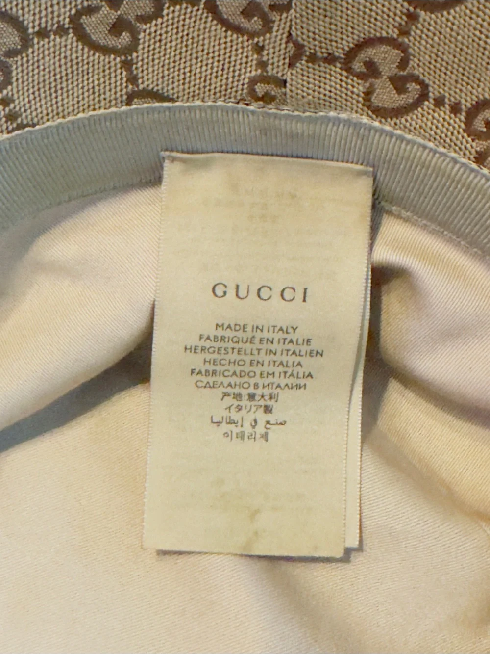 Gucci Beige GG Monogram Bucket Hat with Taupe Band and Gold Logo